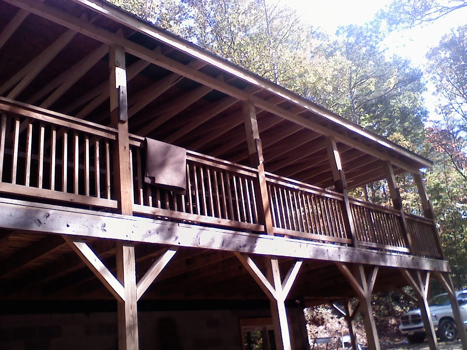Timber framing under a new elevated porch and deck — Roof Leak Repair in Omro by Roofing Brothers
